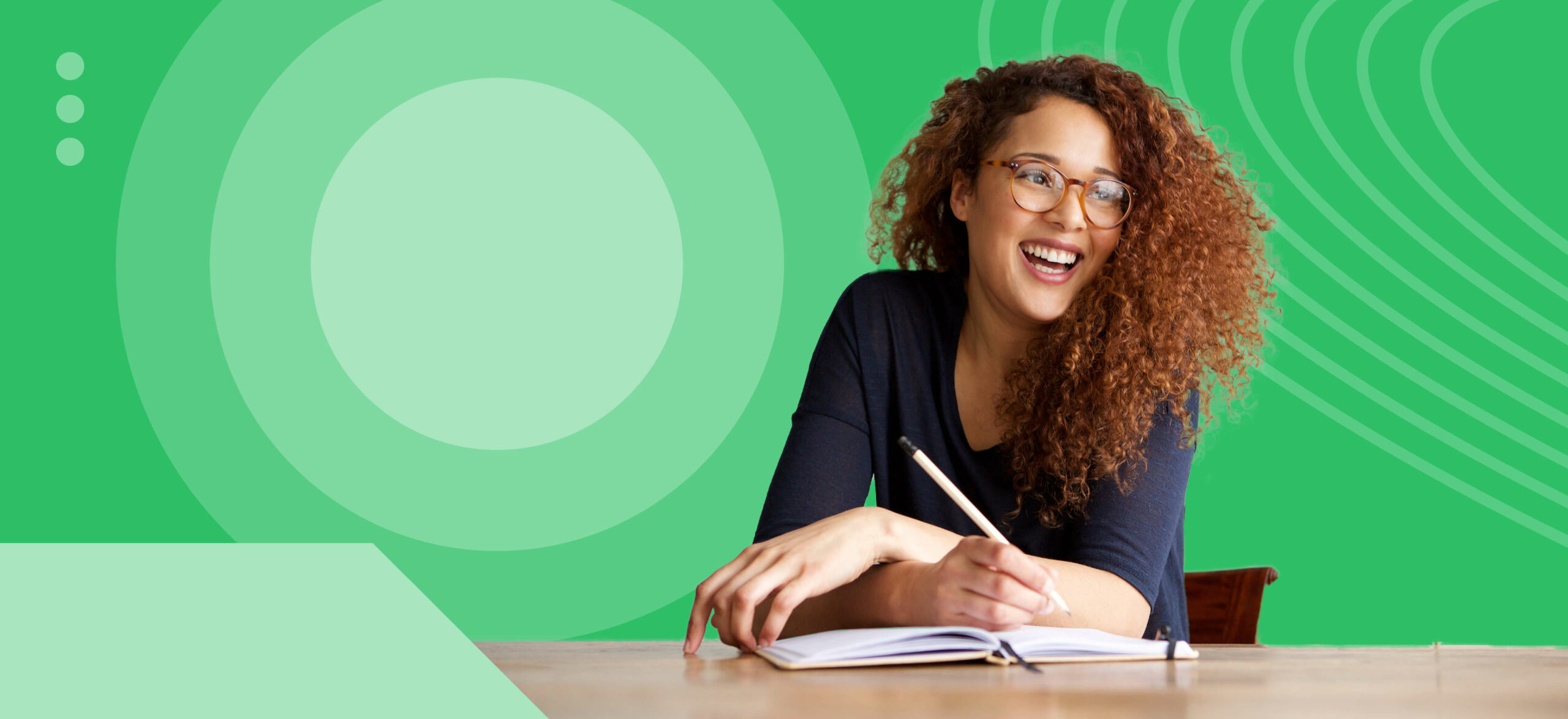 woman writing with a green background behind