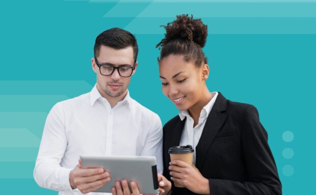 Two professionals reviewing information on a tablet with a teal background